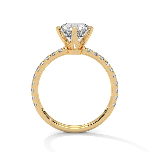 “Celestia Ring—round-cut diamond brilliance, secure six-prong elegance, and pavé-band sparkle crafted to symbolize timeless beauty, lasting love, and radiant sophistication.”