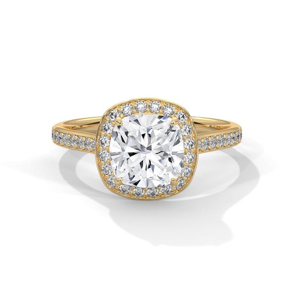 A dazzling cushion-cut lab-grown diamond encircled by a radiant halo and pavé band — timeless elegance with a modern soul.