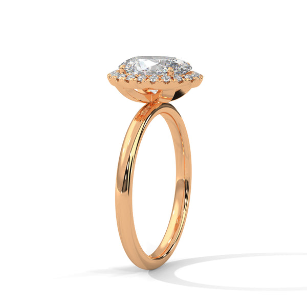 A graceful oval-cut lab-grown diamond encircled by a shimmering halo — effortless elegance with eye-catching brilliance