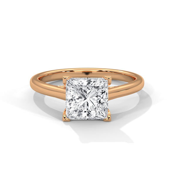 “Celeste Ring—princess-cut diamond brilliance, sleek four-prong solitaire elegance, and timeless white-gold beauty crafted to symbolize pure love, modern style, and lasting grace.”
