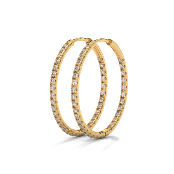 Classic hoops reimagined with a luminous row of diamonds—endless style, infinite sparkle.