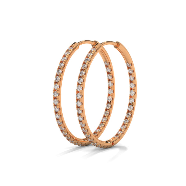 Classic hoops reimagined with a luminous row of diamonds—endless style, infinite sparkle.