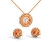 A captivating rose gold pendant and stud earring set featuring dazzling round-cut diamonds arranged in a blooming floral cluster for maximum sparkle and charm.