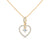 Celebrate love with the Eternal Embrace Heart Pendant, where a sparkling solitaire is cradled within a diamond-studded golden heart.