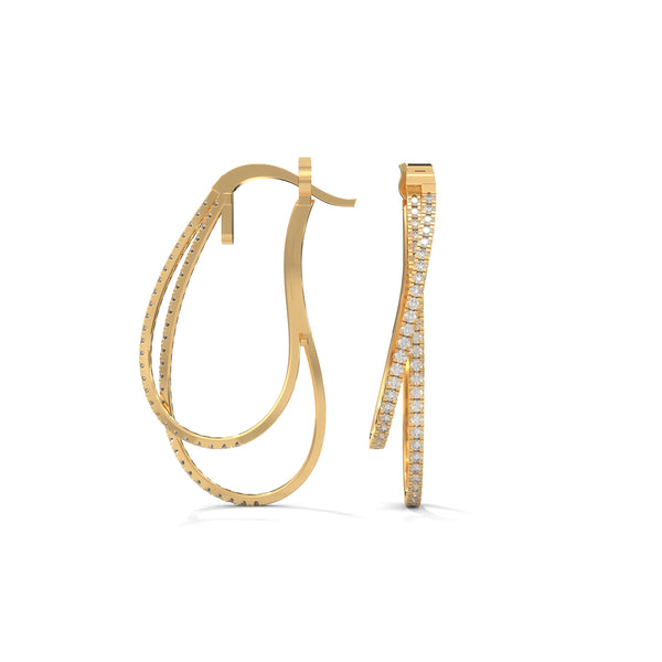 Stylishly layered gold hoops, adorned with sparkling diamonds for a bold yet elegant statement.