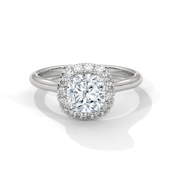 “Cushion-halo diamond ring in yellowgold—brilliant center sparkle, timeless elegance,and luxurious shine crafted for everlasting loveand unforgettable moments.”