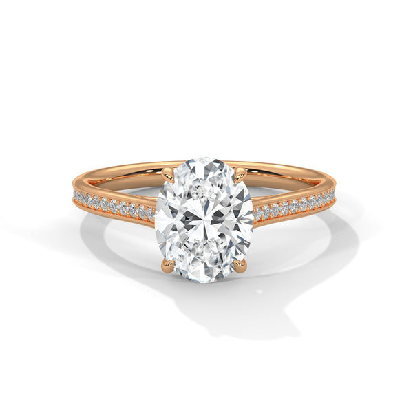 “Oval-cut diamond ring in yellow gold—brilliantsolitaire sparkle, pavé band elegance, andtimeless luxury crafted for unforgettable love.”