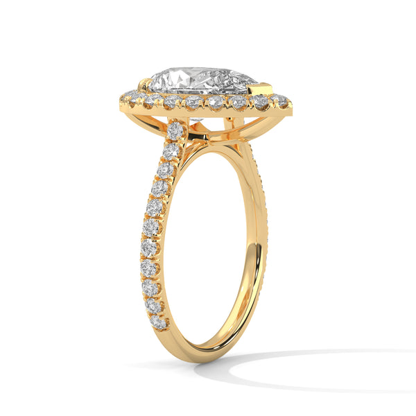 “Pear-shaped diamond halo ring in rosegold—radiant brilliance, pavé-band sparkle, andluxurious elegance crafted for timeless love andunforgettable moments.”