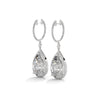 Dramatic rose gold danglers with pear-shaped centerpieces and a cascade of diamonds for breathtaking brilliance.