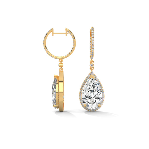 Dramatic rose gold danglers with pear-shaped centerpieces and a cascade of diamonds for breathtaking brilliance.