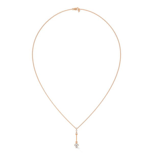 A sleek cascade of gold and diamonds, the Celestial Drop Diamond Pendant offers minimalist elegance with a cosmic sparkle.