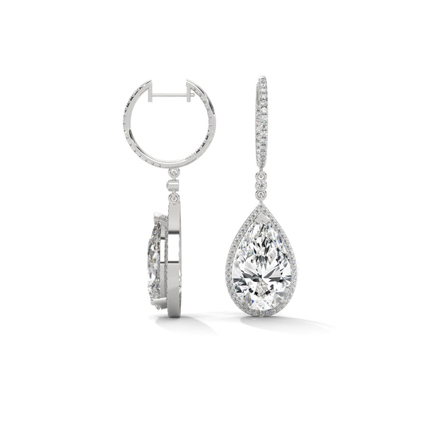 Dramatic rose gold danglers with pear-shaped centerpieces and a cascade of diamonds for breathtaking brilliance.