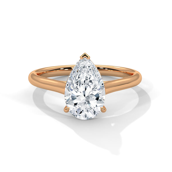 “Discover timeless elegance with our pear-shapeddiamond solitaire ring—crafted in yellow gold for brilliant sparkle, modern luxury, and everlasting love.”