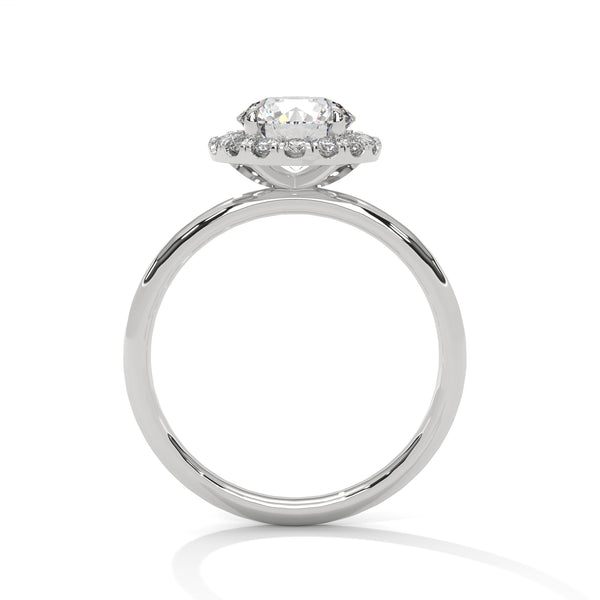 A classic round lab-grown diamond framed by a radiant halo — timeless brilliance with modern grace
