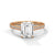 The Celestial Elegance Ring features a striking emerald-cut diamond embraced by a delicate band adorned with shimmering pave stones. A timeless piece that symbolizes everlasting love and sophistication.