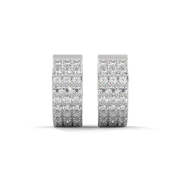 Elegant yellow gold huggie earrings adorned with three radiant rows of dazzling diamonds.