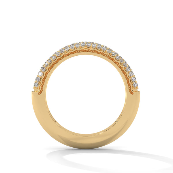 A dazzling yellow gold band pavé-set with three rows of brilliant round diamonds, delivering radiant sparkle from every angle.
