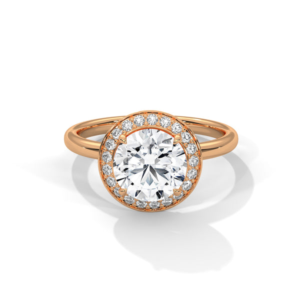 “Celestial Halo Ring—round-cut brilliance, radiant halo sparkle, and white-gold elegance crafted to symbolize everlasting love, timeless beauty, and unforgettable engagements.”