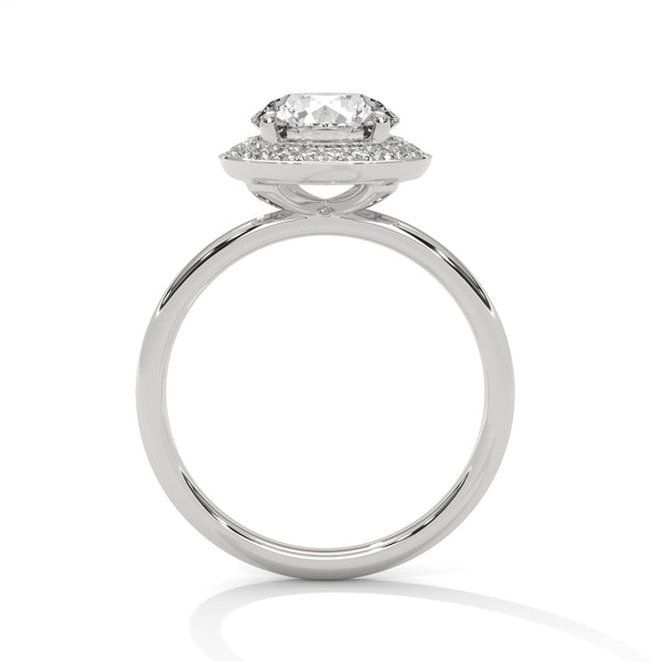 “Celestial Halo Ring—round-cut brilliance, radiant halo sparkle, and white-gold elegance crafted to symbolize everlasting love, timeless beauty, and unforgettable engagements.”