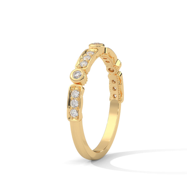 A whimsical yellow gold band featuring alternating bezel and pavé-set diamonds, creating a playful, elegant sparkle.