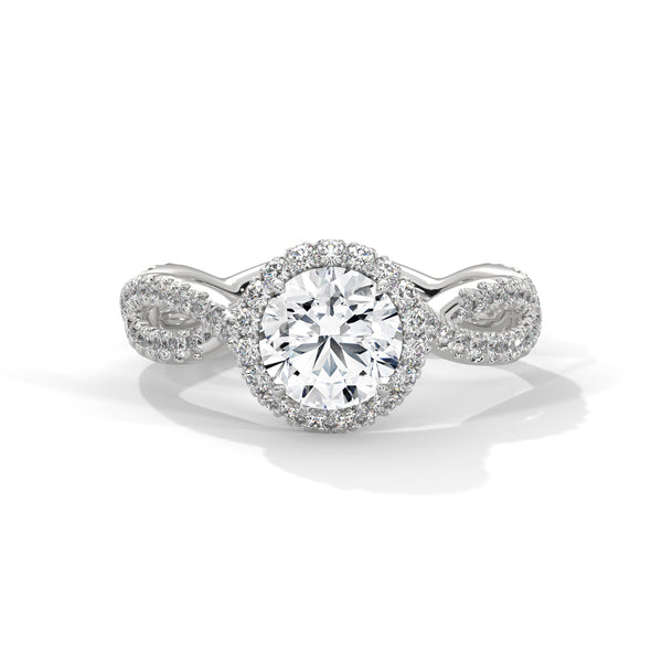 “Seraphina Ring—round-diamond brilliance, radiant halo sparkle, and intertwined pavé elegance crafted to symbolize timeless love, romantic beauty, and everlasting commitment.”