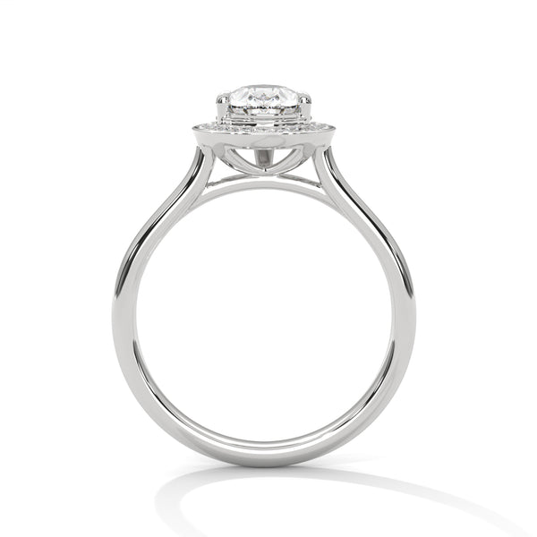 “Celeste Ring—pear-shaped diamond brilliance, radiant halo sparkle, and modern white-gold elegance crafted to symbolize celestial beauty, timeless love, and unforgettable moments.”