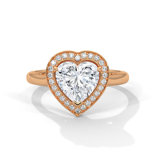 “Amora Ring—heart-shaped diamond brilliance, radiant pavé halo, and romantic white-gold elegance crafted to symbolize pure love, timeless beauty, and unforgettable moments.”