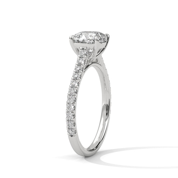 “Lumière Ring—cushion-cut diamond brilliance, pavé-band sparkle, and refined white-gold elegance crafted to symbolize timeless beauty, radiant love, and unforgettable moments.”
