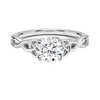A round brilliant solitaire embraced by an intricate vine-inspired setting, intertwining elegance and organic artistry.