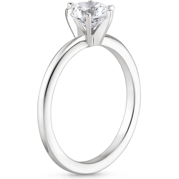 “Timeless six-prong yellow gold solitaire ring delivering exceptional brilliance, classic luxury, and enduring elegance for unforgettable engagements and lifelong love.”