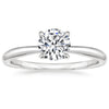 “Elegant diamond engagement ring with shimmering pavé band, crafted in timeless white gold to symbolize love, luxury, brilliance, and lifelong commitment.”