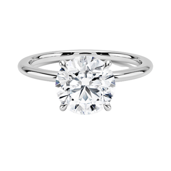 “Elevate your love with this timeless solitaire engagement ring, featuring a brilliant round diamond and sleek band for ultimate elegance.”