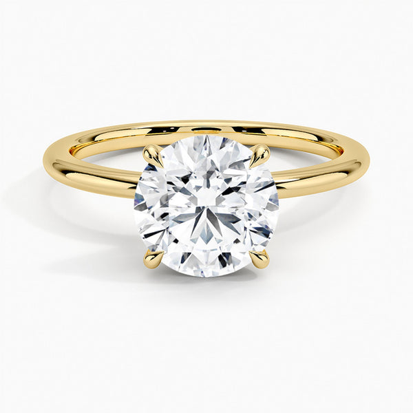 “Elevate your love with this timeless solitaire engagement ring, featuring a brilliant round diamond and sleek band for ultimate elegance.”