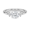 A symbol of harmony and devotion, the Lunara Grace features a round brilliant center flanked by perfectly matched side stones on a gracefully tapered band.