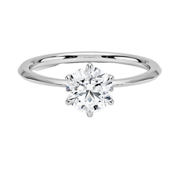 Solenya Whisper is a sleek, minimalist solitaire ring that blends subtle elegance with enduring craftsmanship, letting its brilliant center diamond speak volumes.