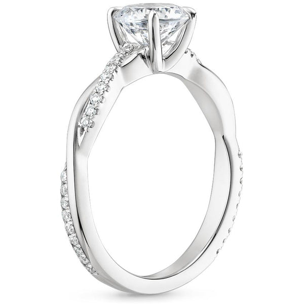 “Celebrate timeless romance with this twisted diamond engagement ring, blending modern brilliance and delicate pavé detailing for unforgettable sparkle and elegance.”