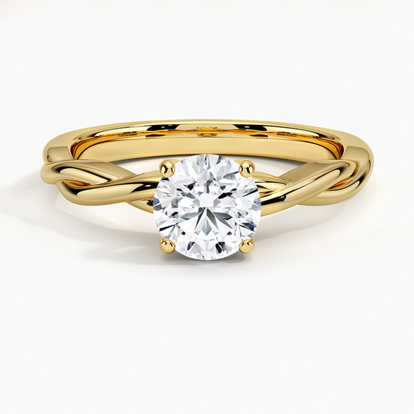A bold expression of timeless beauty, the Solara Crest features a radiant round diamond set atop a luminous yellow gold band—classic, confident, and endlessly elegant.