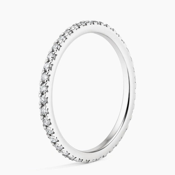 “Elegant diamond eternity band showcasing brilliant sparkle and timeless luxury, crafted for modern brides seeking sophisticated style and lasting beauty.”