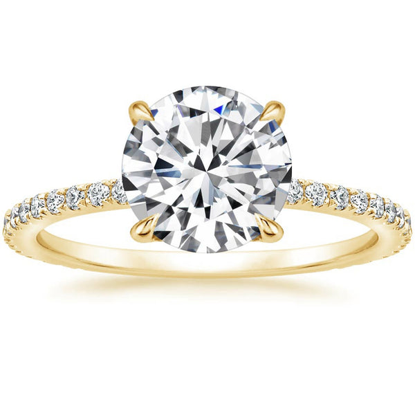 “Elevate your love with this dazzling round-cut diamond ring, featuring a sparkling pavé band crafted for timeless elegance and unforgettable brilliance.”