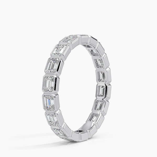 “Elevate your elegance with this emerald-cut diamond eternity ring, showcasing timeless brilliance, luxurious craftsmanship, and radiant gold sophistication for every occasion.”