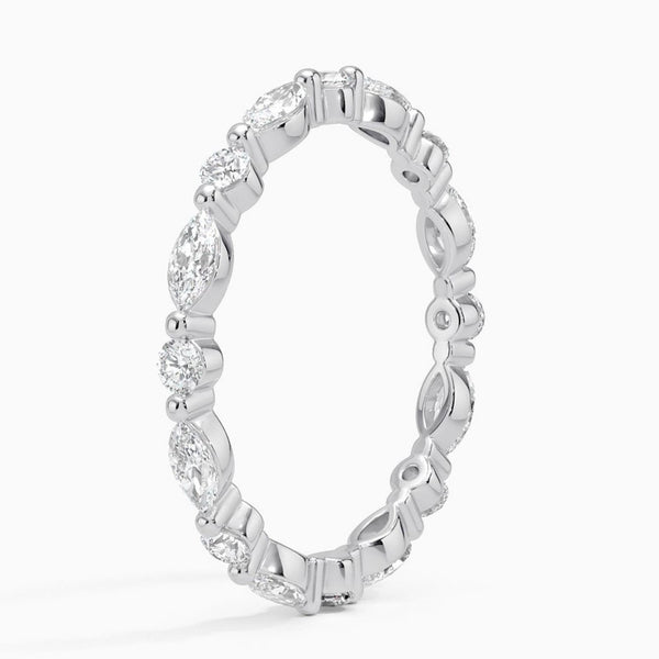 “Elevate your elegance with this marquise and round diamond eternity ring, crafted in luxe yellow gold for timeless sparkle and lasting brilliance.”