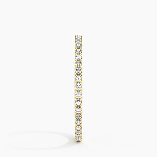 “Timeless diamond eternity band crafted for lasting brilliance, offering a sleek, elegant design perfect for stacking, weddings, and everyday luxury style.”