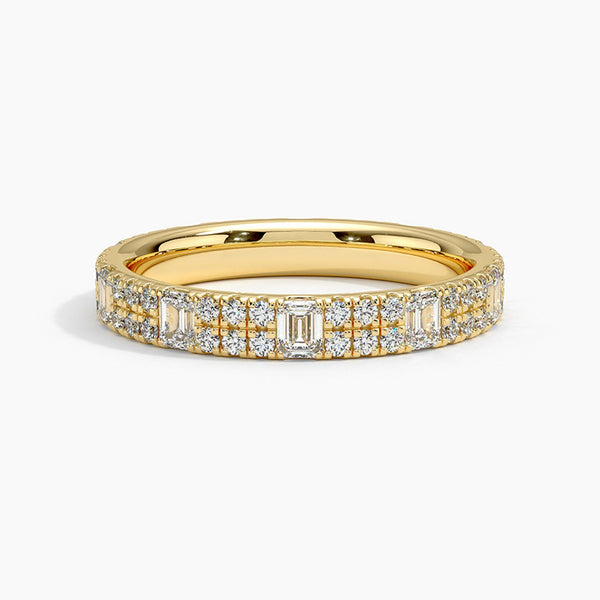 Radiate timeless elegance with this yellow-gold diamond band, featuring brilliant round and baguette stones for a luxurious, sparkling statement of everlasting love.
