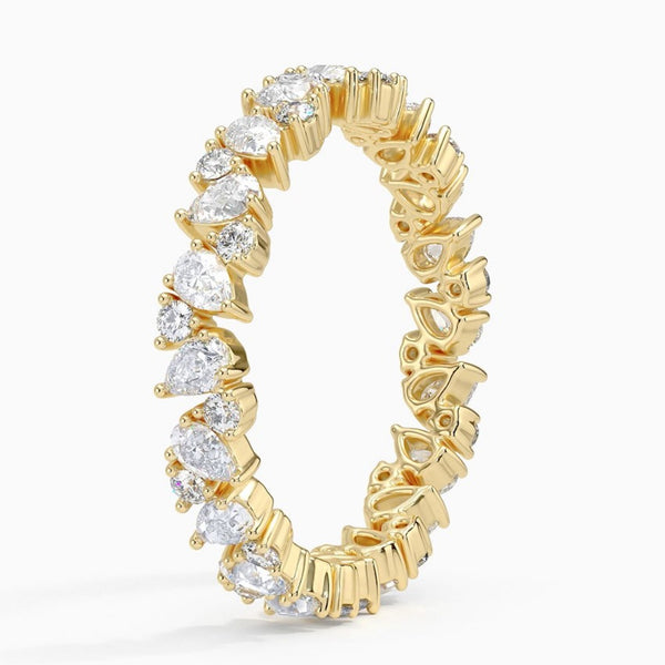 “Celebrate everlasting elegance with this pear-shaped diamond eternity ring, crafted for luxury lovers seeking timeless brilliance, sparkle, and unmatched sophistication.”