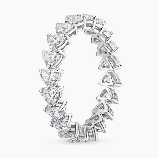 “Celebrate endless love with this heart-shaped diamond eternity ring, crafted in glowing yellow gold for timeless brilliance and romantic luxury.”