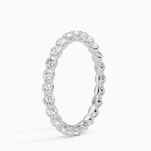 “Elegant diamond eternity ring crafted in shimmering white metal, showcasing brilliant round stones for timeless sparkle, luxury style, and lasting sophistication.”