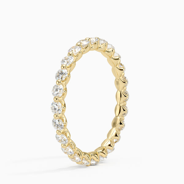 “Elegant diamond eternity ring crafted in shimmering white metal, showcasing brilliant round stones for timeless sparkle, luxury style, and lasting sophistication.”