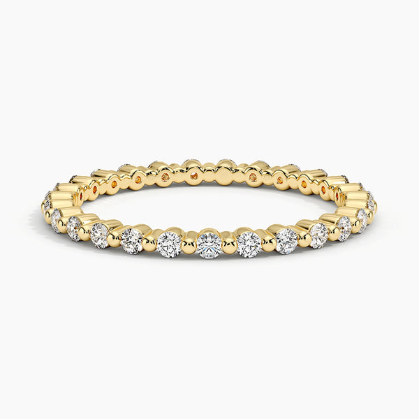 "Elegant gold diamond eternity ring offering timeless sparkle, delicate brilliance, and perfect everyday luxury for stacking, gifting, or celebrating love."