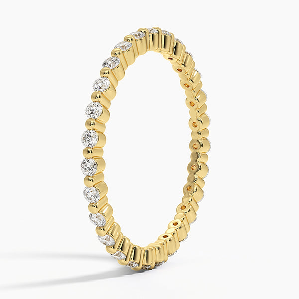 "Elegant gold diamond eternity ring offering timeless sparkle, delicate brilliance, and perfect everyday luxury for stacking, gifting, or celebrating love."