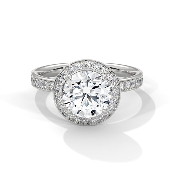 “Radiant Halo Ring—brilliant center diamond, dazzling halo sparkle, and white-gold elegance crafted to symbolize everlasting love, timeless beauty, and unforgettable moments.”